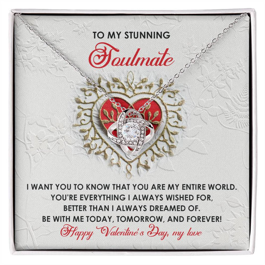 The Soulmate-Be With Me - Love Knot Necklace showcases interlocking hearts and an infinity symbol, embellished with cubic zirconia crystals in a gold finish. It includes a card featuring a romantic Valentine's Day message for your soulmate.