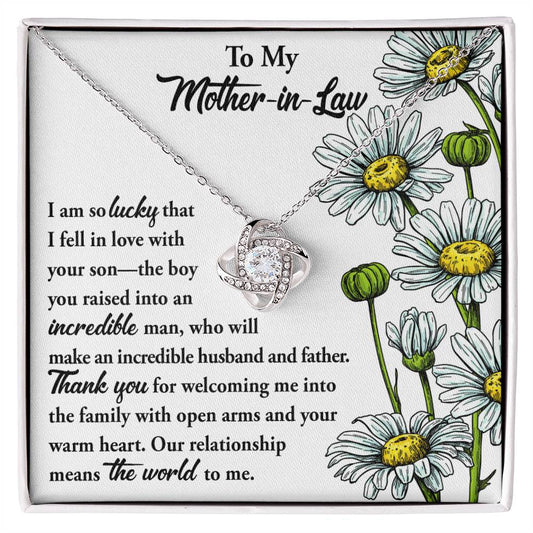 To Mother-In-Law, Warm Heart - Love Knot Necklace on a floral card with a heartfelt message to a mother-in-law, expressing gratitude and affection.