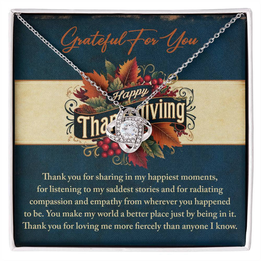 A Thanksgiving-Happiest Moments Love Knot Necklace featuring a crystal-studded pendant adorns a card that expresses heartfelt gratitude.