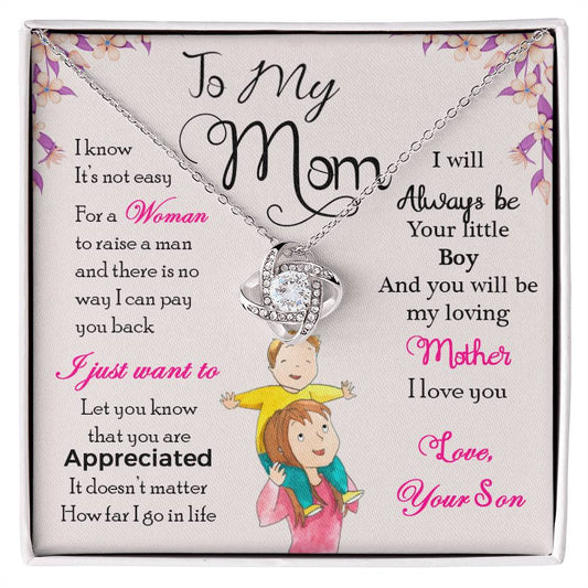 A "To My Mom, I Will Always Be Your Little Boy" Love Knot Necklace with a heart pendant displayed on a card with a sentimental message from a son to his mother by ShineOn Fulfillment.
