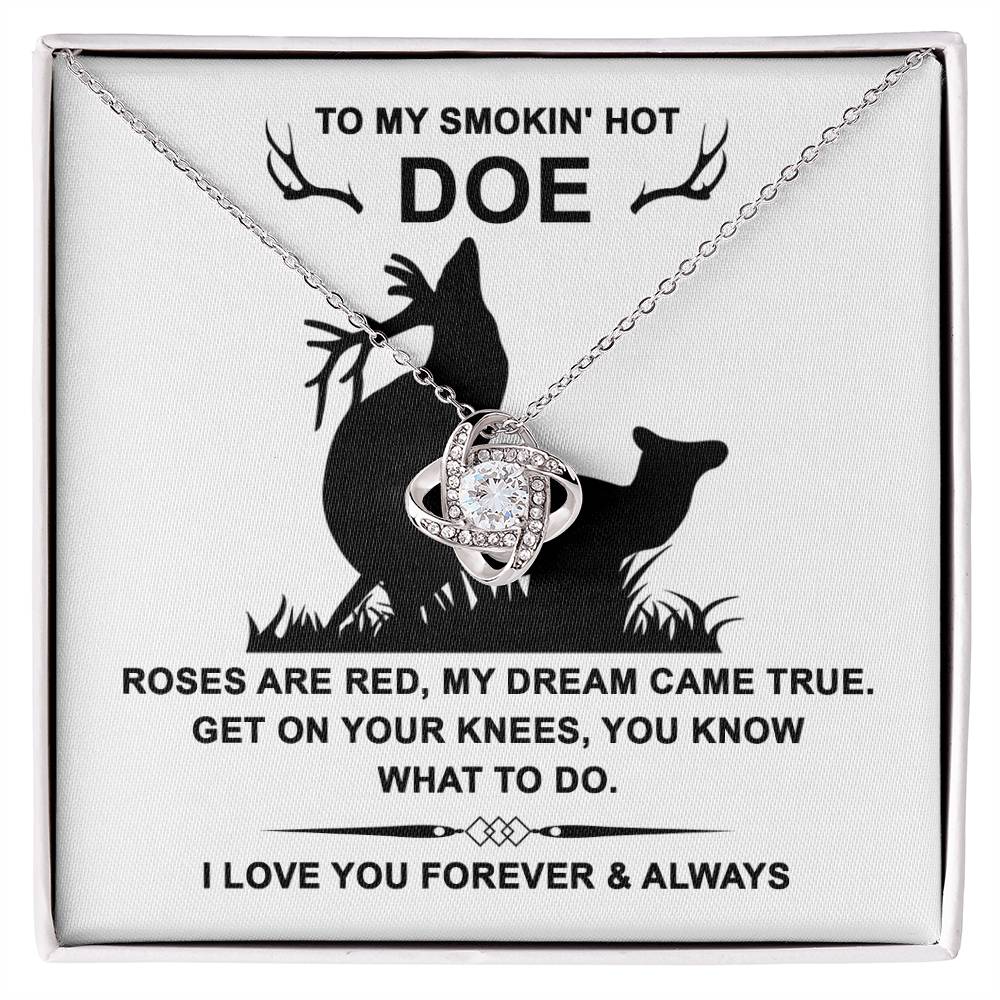 The Soulmate-Dream Came True Love Knot Necklace, crafted in 14k white gold and sparkling with cubic zirconia, features deer silhouettes and comes nestled in a box with a romantic message.