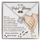 A personalized gift box with a To Mama To Be, Now And Forever - Love Knot Necklace from ShineOn Fulfillment, featuring cubic zirconia, and a heartfelt printed message from an unborn baby to its mother.
