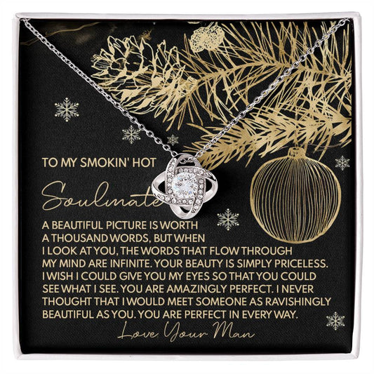 The Soulmate-Amazingly Perfect - Love Knot Necklace, crafted from 14k white gold and featuring a heart-shaped infinity pendant adorned with cubic zirconia crystals, is beautifully presented on a decorative card accented with romantic messages and festive illustrations.