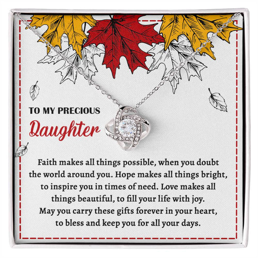 The Daughter-Fill Your Life - Love Knot Necklace, adorned with cubic zirconia crystals, is displayed with a heartfelt message that reads: "To my precious daughter. Faith makes all things possible, hope makes all things bright, love makes all things beautiful." This personalized gift perfectly captures the essence of your feelings.