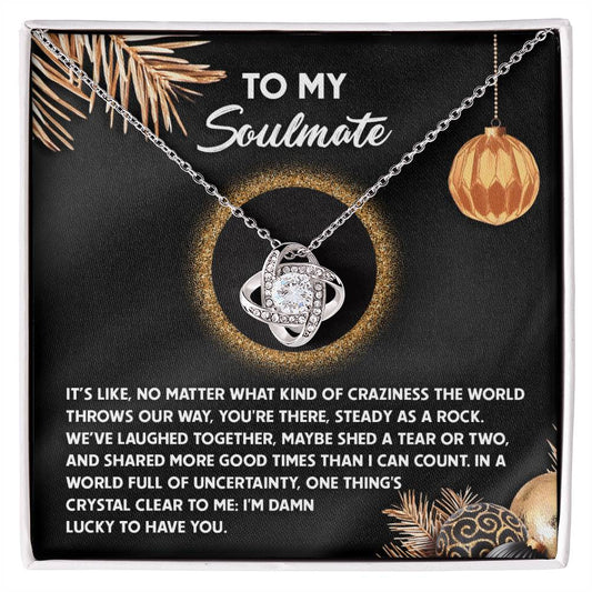 The Soulmate-I Can Count - Love Knot Necklace, embellished with cubic zirconia crystals, is beautifully presented in a black and gold themed jewelry box that carries a heartfelt inscription, making it an ideal gift for your loved one.