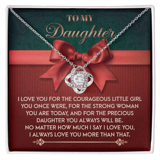 The Daughter-Always Will Be - Love Knot Necklace features an intertwined design embellished with sparkling cubic zirconia crystals, presented on a card with the inscription: "To My Daughter" and a heartfelt message of love and appreciation. It is available in both white gold and yellow gold finishes.