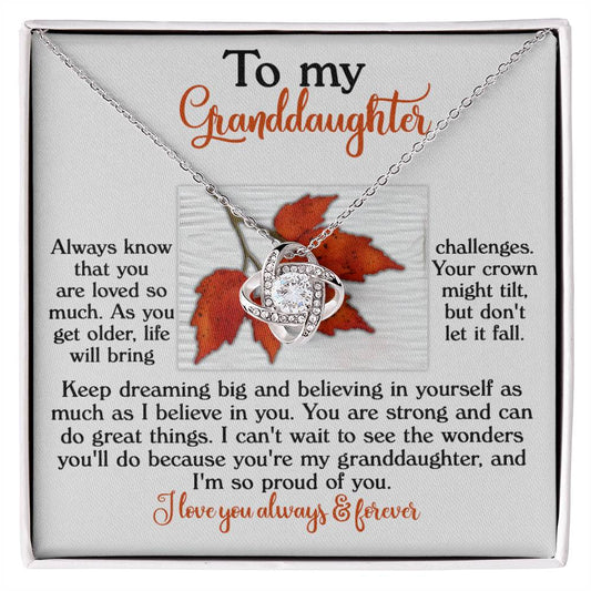 This "Granddaughter-Do Great Things - Love Knot Necklace" is beautifully presented on a card with an uplifting message for your granddaughter, embodying encouragement and love. With a gold finish and an autumn leaf background, this charming piece radiates elegance with the dazzling beauty of cubic zirconia.