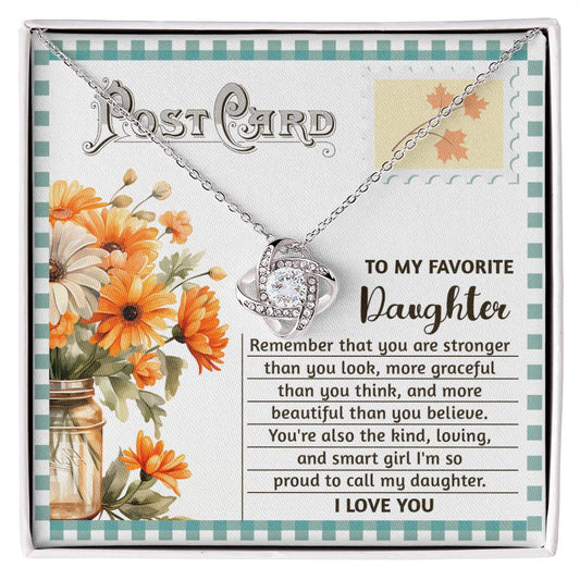 The Daughter-Smart Girl - Love Knot Necklace showcases an interlocking heart pendant embellished with brilliant cubic zirconia crystals. It is elegantly displayed on a card that says, "To my favorite Daughter," accompanied by a touching message and decorated with a floral design and vintage postcard motif.