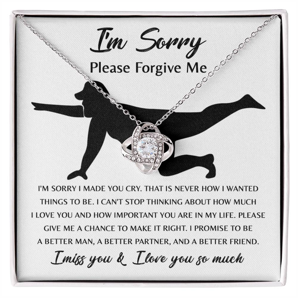 The Sorry-Things to Be Love Knot Necklace features an intertwined knot pendant adorned with cubic zirconia crystals and comes with a heartfelt card that depicts a silhouette of a person kneeling and the words, "I'm sorry, please forgive me... I promise to be a better man..." among other touching text. This classic gift speaks volumes.