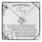 The Sorry-Care For You - Love Knot Necklace features a pendant with intertwined loops adorned with sparkling cubic zirconia crystals. It is elegantly displayed on a card that conveys an apology message, reading "I'm sincerely sorry," expressing deep regret and love.