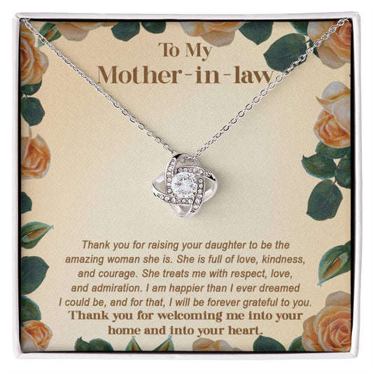 A To Mother-in-law, Grateful To You - Love Knot Necklace with a heart pendant and a message on a floral background.