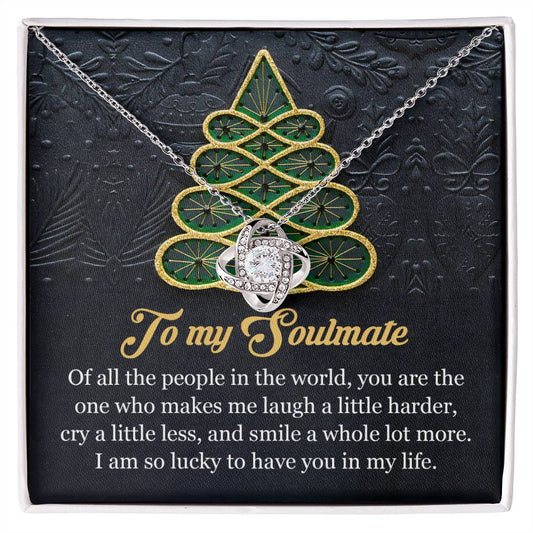 The Soulmate-In My Life - Love Knot Necklace is showcased with a pendant set against a box decorated with a green and gold tree motif, embellished with cubic zirconia crystals, and comes with an affectionate message for your soulmate.