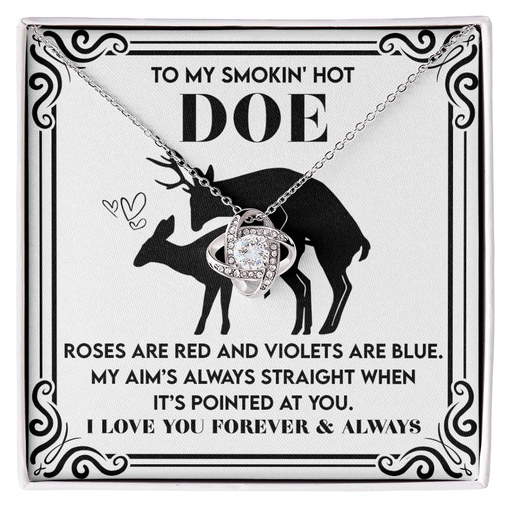 The Soulmate-Pointed At You - Love Knot Necklace showcases an intertwined design with cubic zirconia crystals and comes with a deer silhouette card. Available in white or yellow gold, it includes a playful rhyme expressing heartfelt affection.