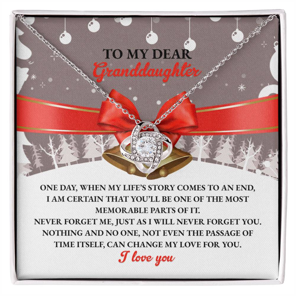 The Granddaughter-Memorable Parts - Love Knot Necklace, featuring dazzling cubic zirconia crystals, is presented in a gift box along with a touching message for your granddaughter. This personalized keepsake elegantly intertwines themes of love and remembrance, making it a treasured gift she'll hold dear forever.