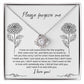 The Sorry-Real Explanation - Love Knot Necklace features an intertwined heart pendant adorned with cubic zirconia crystals, presented in a box. The box lid includes an apology note with floral illustrations, expressing regret, love, and a plea for forgiveness.