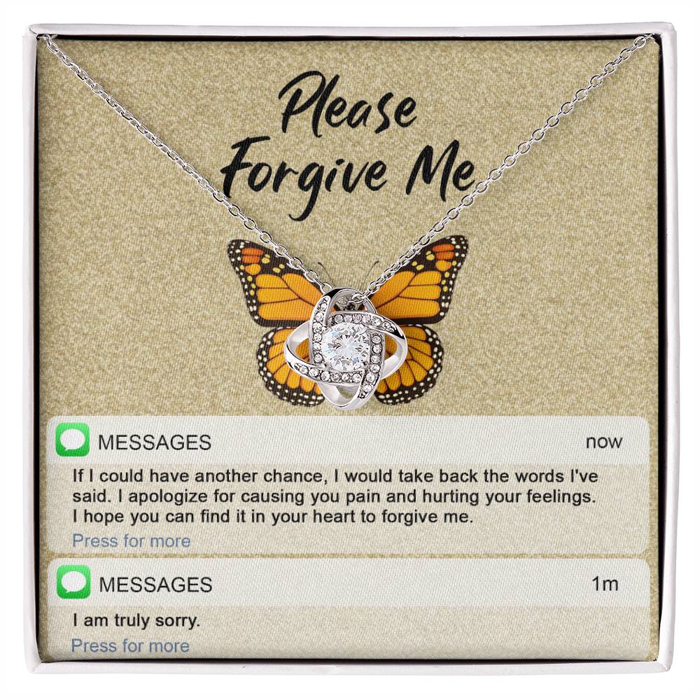 The "Sorry-In Your Heart - Love Knot Necklace" features a butterfly backdrop with cubic zirconia crystals, displayed above a printed message that reads "Please Forgive Me." Below the message, it includes an apology text and a brief follow-up with "I am truly sorry.