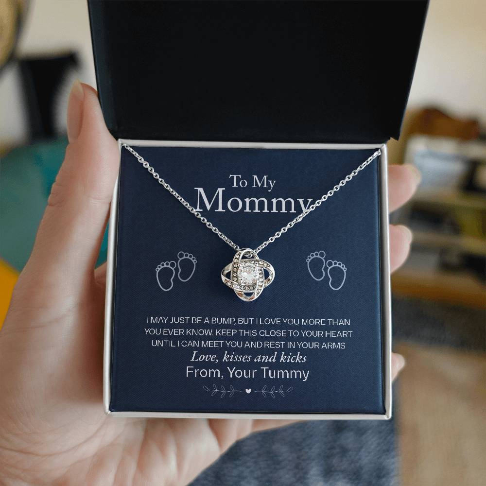 A To My Mommy, Love From Your Tummy - Love Knot Necklace with a heart-shaped pendant in a gold finish, nestled in a box and accompanied by a sentimental note to a mother from an unborn child. Brand: ShineOn Fulfillment