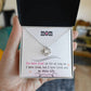 A "To My Mom, I Loved You My Whole Life" Love Knot Necklace in a gold finish, presented in a gift box accompanied by a sentimental message. Brand Name: ShineOn Fulfillment