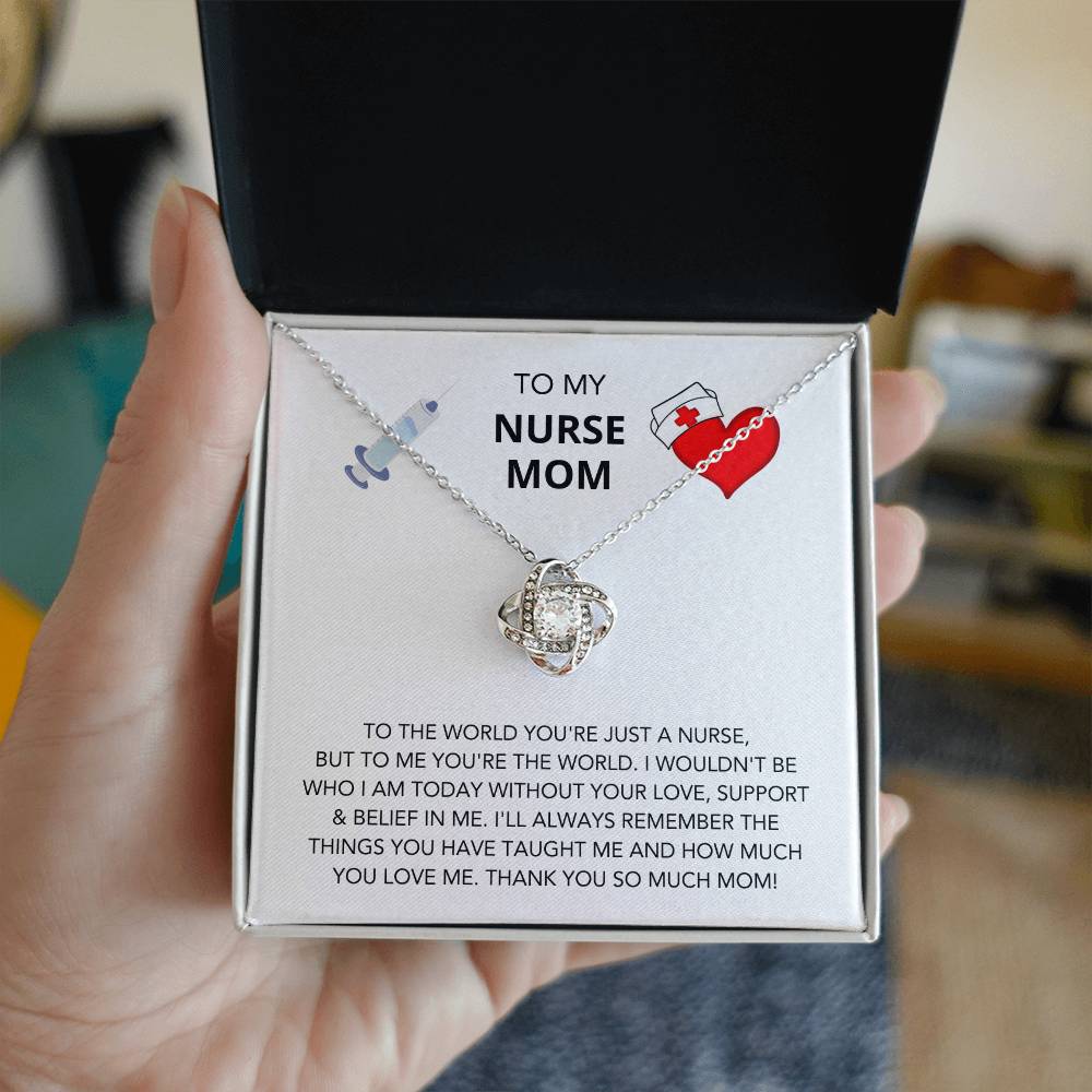 A "To My Nurse Mom, To The World You're Just A Nurse" Love Knot Necklace with cubic zirconia crystals is presented inside a gift box by ShineOn Fulfillment, expressing love and gratitude.
