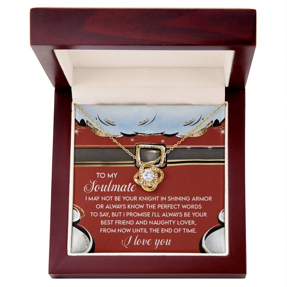 The Soulmate-Naughty Lover - Love Knot Necklace, featuring a stunning central gem and cubic zirconia crystals, is beautifully presented in a wooden box with an inscription about soulmates and love.