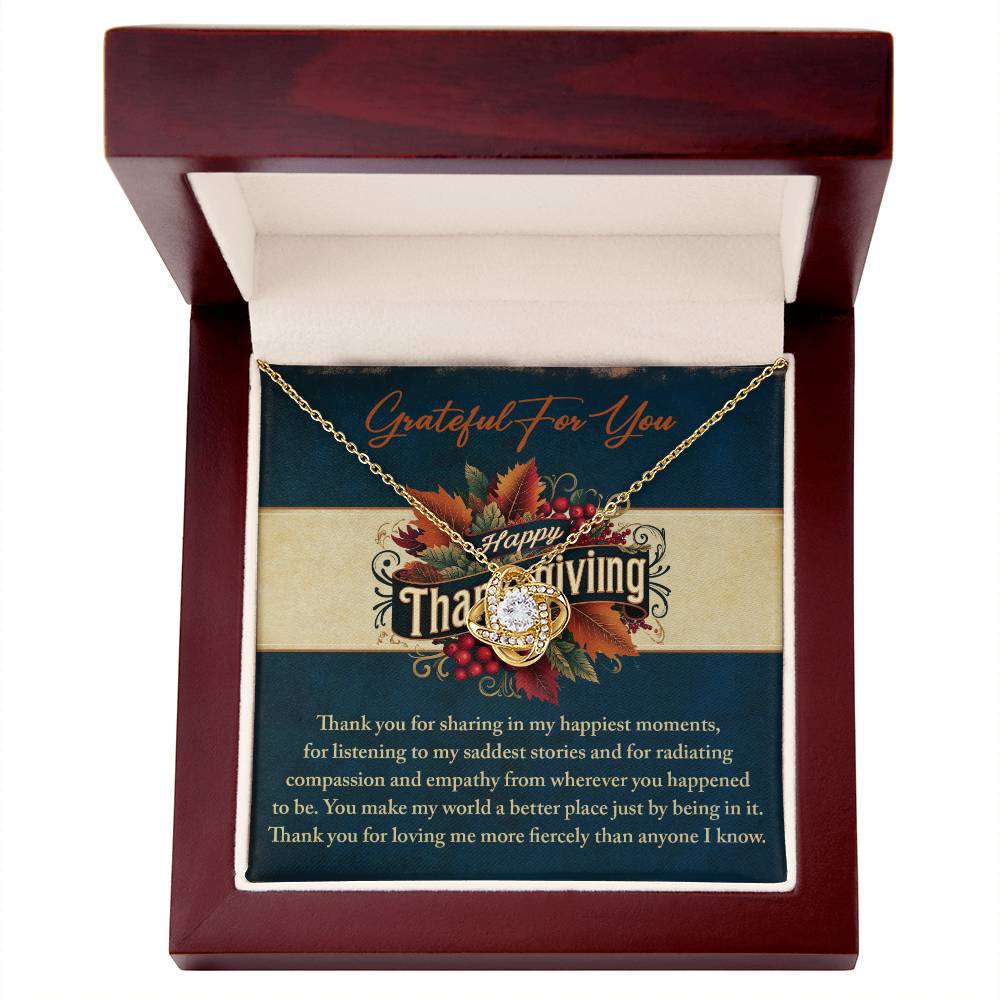 This Thanksgiving-Happiest Moments - Love Knot Necklace showcases a heart pendant and is beautifully presented in a wooden box. It comes with a heartfelt Thanksgiving message set against an autumn-themed background, making it the perfect token of gratitude and warmth for the season.