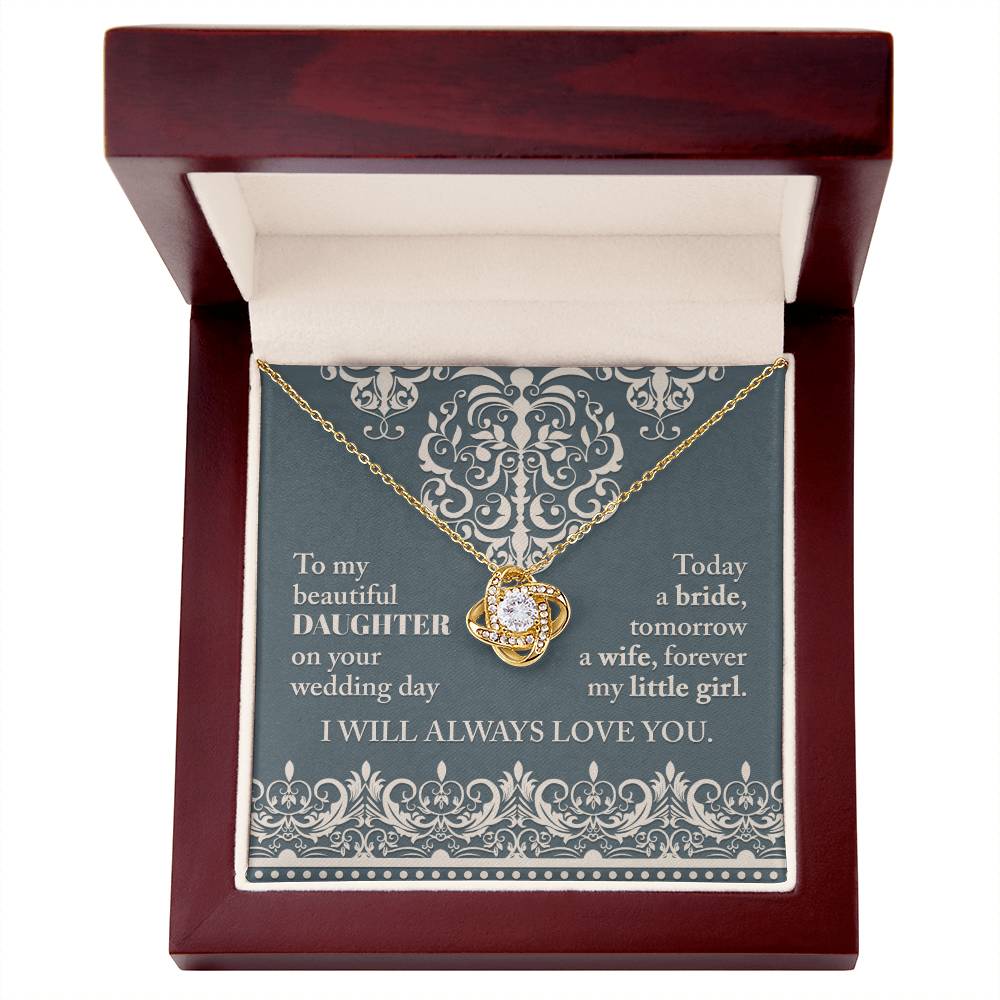 A To My Daughter Wedding, Always Love You - Love Knot Necklace with an intertwined pendant adorned with cubic zirconia crystals on a decorative card. The card reads: "To my beautiful daughter on your wedding day. Today a bride, tomorrow a wife, forever my little girl. I will always love you.