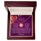 The Soulmate-My Soul - Love Knot Necklace, with a radiant gold finish and stunning cubic zirconia accents, nestles in a box accompanied by a heartfelt message of love and gratitude for your soulmate.