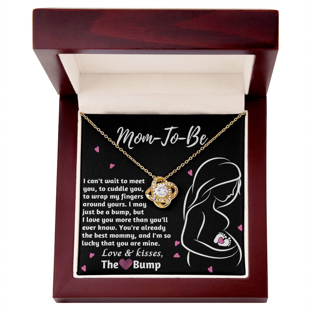 A To Mama To Be, The Best Mommy - Love Knot Necklace in a box with a message for a mom-to-be, featuring a pendant of a mother and child silhouette by ShineOn Fulfillment.