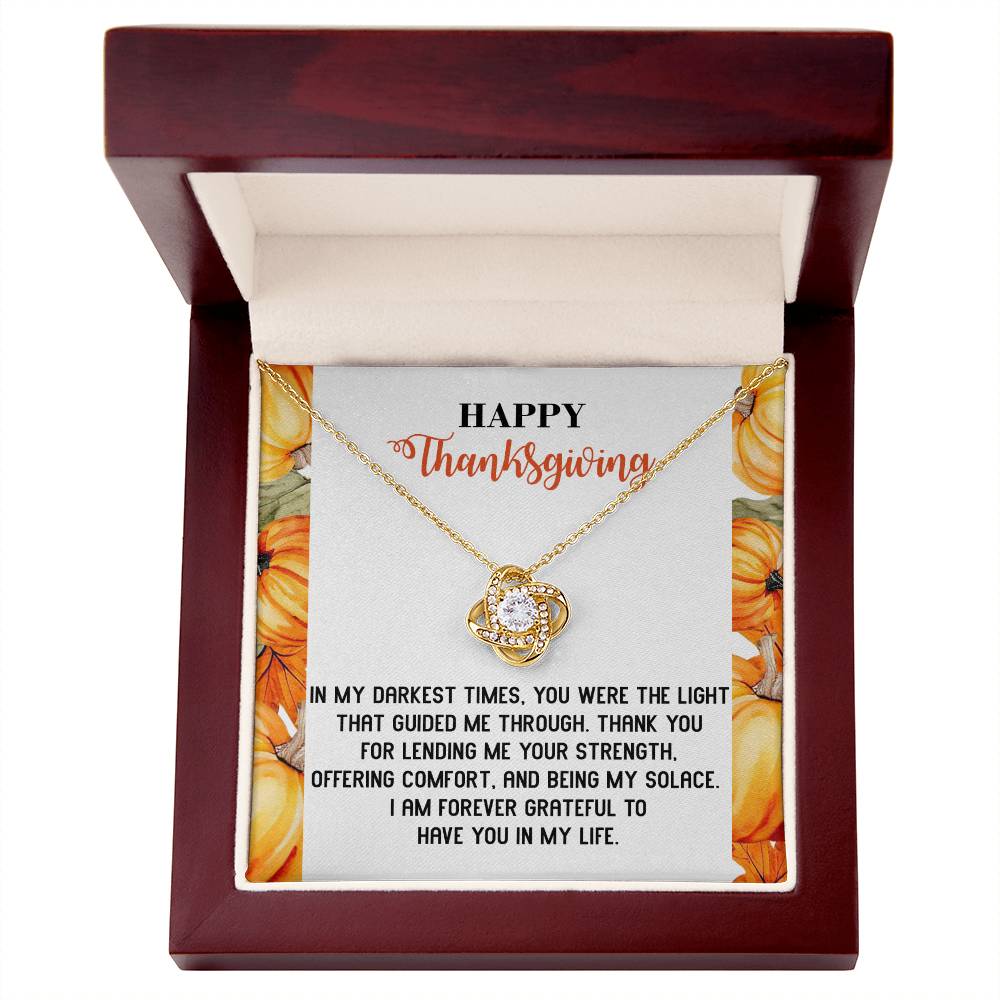 The Thanksgiving-Guided Me Through - Love Knot Necklace features a round pendant inscribed with "Happy Thanksgiving," adorned with cubic zirconia crystals. Presented in a gift box, it holds a heartfelt note inside—making it the perfect symbol of your unbreakable bond.