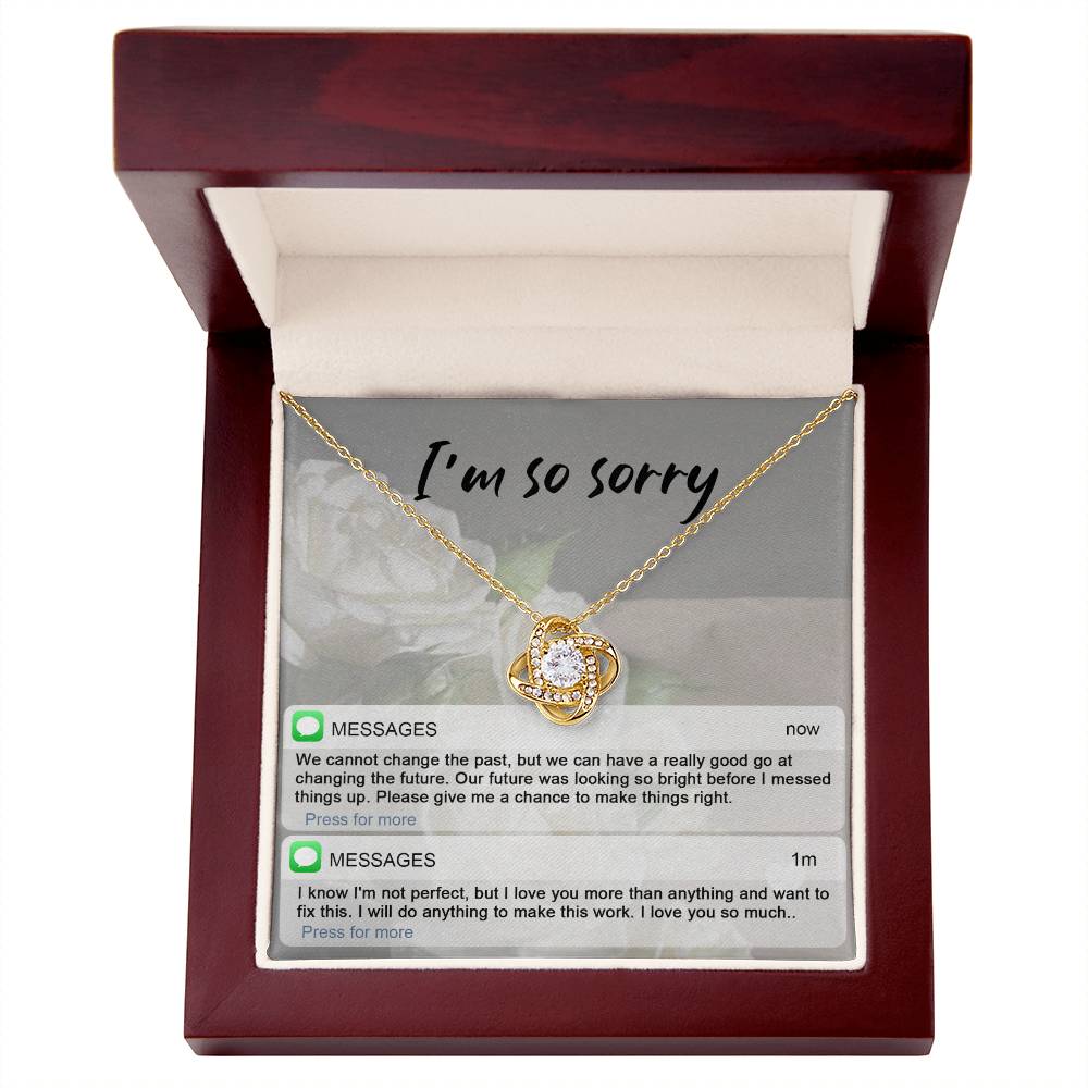 A stunning Sorry-I_m Not Perfect - Love Knot Necklace with cubic zirconia crystals is displayed on an "I'm so sorry" card. Below are text messages expressing regret and love, asking for a chance to make things right.