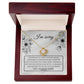 A "Sorry-Made A Mistake - Love Knot Necklace" features a box with a heartfelt apology message. The white gold finish and cubic zirconia crystals shimmer, as the text expresses deep regret and sorrow for causing hurt, describing the actions as pathetic, cowardly, and selfish, pleading for forgiveness.