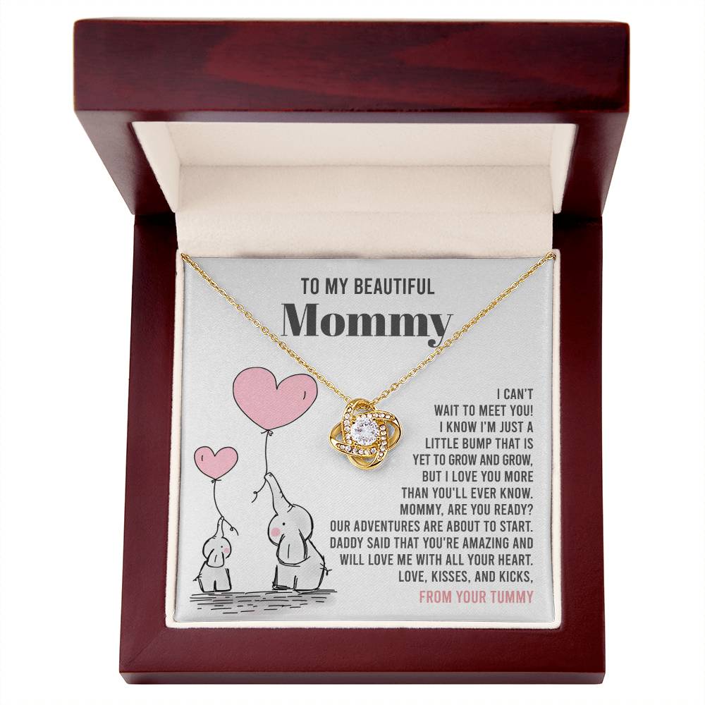 A To Mama To Be, All Your Heart - Love Knot Necklace pendant necklace with a heart-shaped design displayed inside a gift box with a loving message for a mother. Brand Name: ShineOn Fulfillment