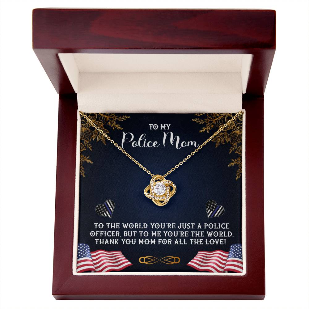 A To My Police Mom, To The World You're Just A Police Officer Love Knot Necklace by ShineOn Fulfillment is displayed inside a jewelry box, with an inscription dedicated to a mother who is a police officer, expressing personal gratitude and love.