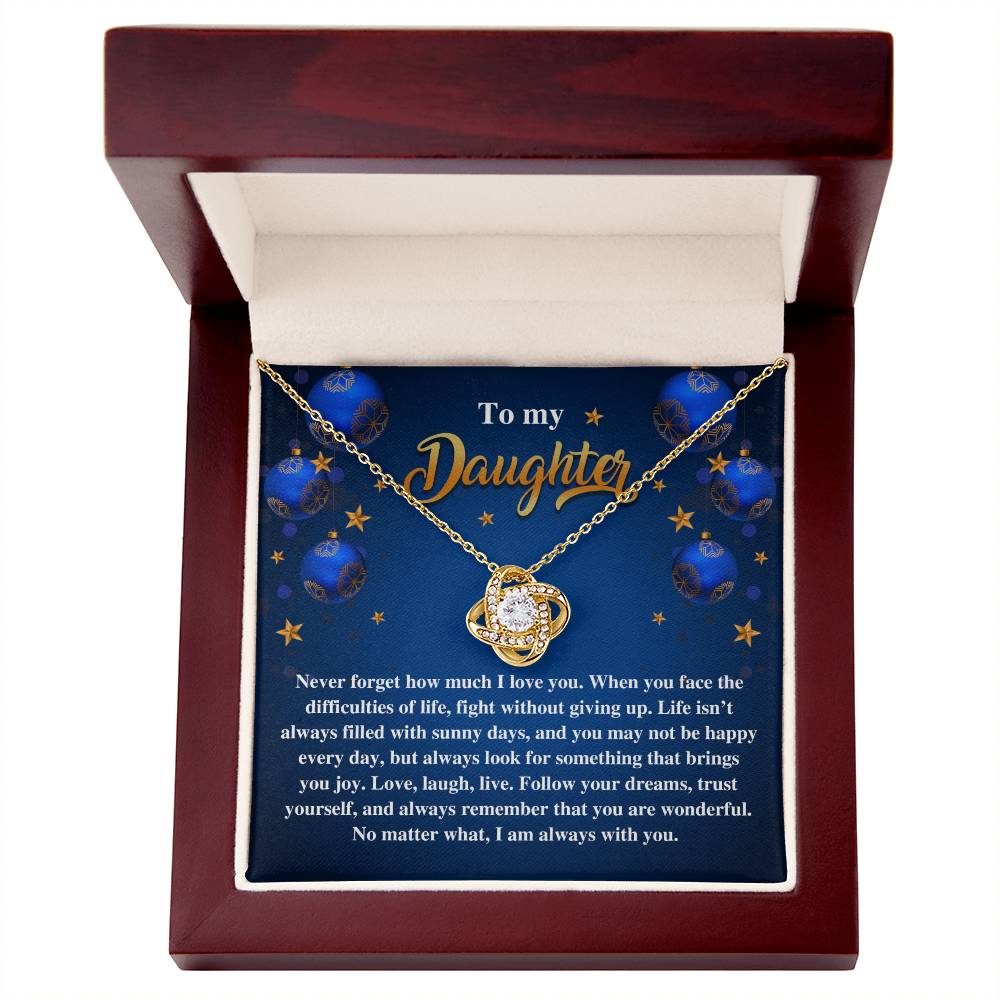 The Daughter-Sunny Days - Love Knot Necklace, featuring a planet pendant, is elegantly presented in an open wooden box. The lid holds a heartfelt message addressed "To my Daughter," beautifully accented with sparkling cubic zirconia crystals, making this personalized gift truly inspiring and unforgettable.