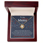 The "Mom To Be-At First Sight" Love Knot Necklace rests in an open box with a heartfelt message to "Mama." Adorned with cubic zirconia crystals, the wooden box in red and gray makes it a perfect personalized gift.