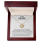 A To My Mom, You Are My First Country - Love Knot Necklace with cubic zirconia crystals and a heart design, presented in a mahogany jewelry box with an inscription for "mom" expressing love and appreciation by ShineOn Fulfillment.