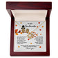 An open wooden jewelry box showcases the "Soulmate-Love You Endlessly - Love Knot Necklace," crafted in 14k white gold and adorned with cubic zirconia crystals. The inside lid displays a heartwarming message dedicated to a soulmate, embellished with two owl illustrations and autumn leaves.