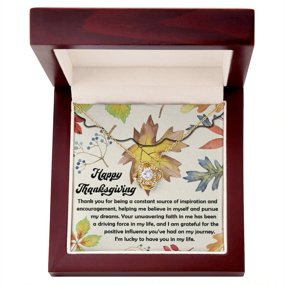 The "Thanksgiving-On My Journey - Love Knot Necklace" is elegantly nestled in a wooden box, accompanied by a message card decorated with autumn leaves and featuring a heartfelt Thanksgiving note that expresses appreciation for support and inspiration. This personalized gift beautifully captures the spirit of gratitude.