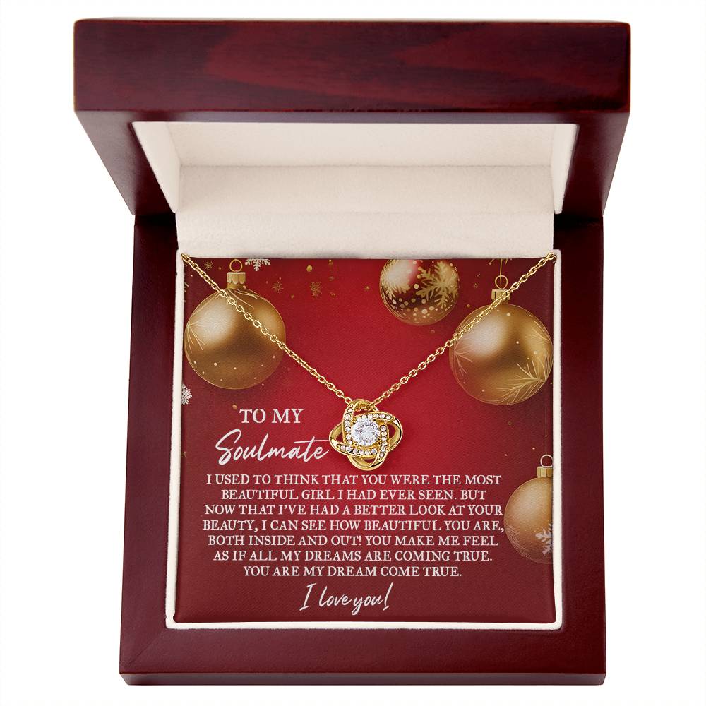 The Soulmate - Your Beauty Love Knot Necklace, embellished with cubic zirconia crystals, is elegantly presented in a red jewelry box and comes with a heartfelt message for a soulmate.