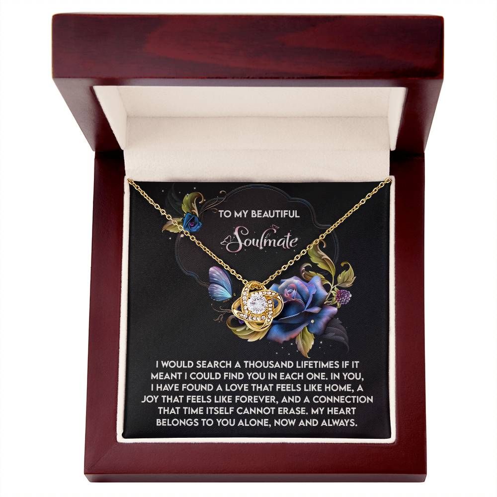 The Soulmate-Like Home - Love Knot Necklace features a floral design adorned with shimmering cubic zirconia, elegantly presented in a wooden box. Accompanied by a heartfelt message label, it's an ideal personalized gift for your soulmate.