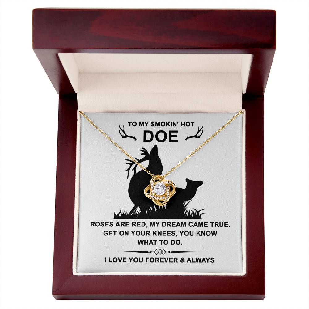 The Soulmate-Dream Came True Love Knot Necklace, decorated with cubic zirconia crystals, is presented in a wooden box with a deer silhouette and a romantic message. Ideal for celebrating an unbreakable bond and symbolizing everlasting love.