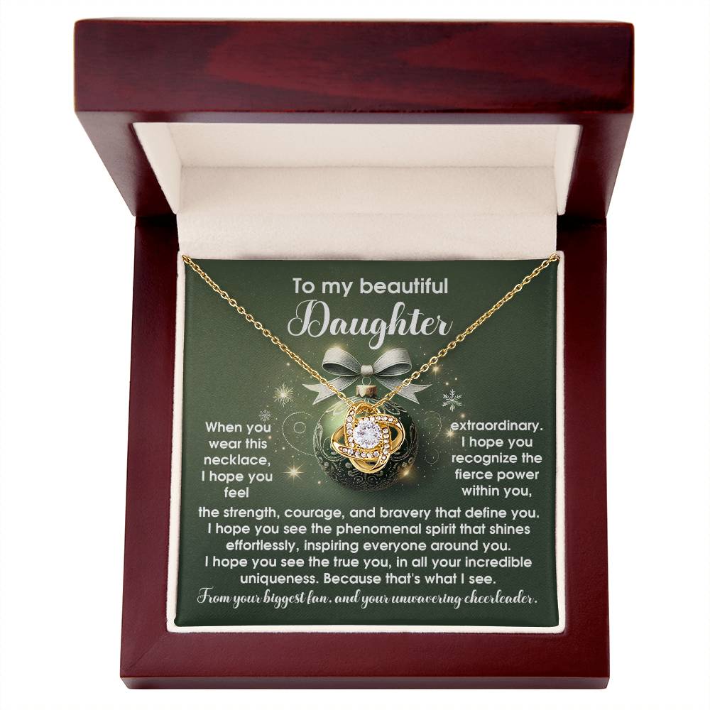 The Daughter-Incredible Uniqueness - Love Knot Necklace, featuring a central diamond, is beautifully presented in an open box. The lid of the box includes a heartfelt message for a daughter, conveying love and encouragement, making it the perfect gift to celebrate those special connections.