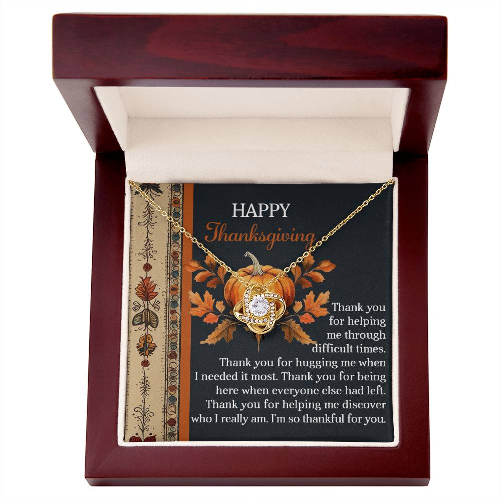 Celebrate Thanksgiving with the "Thanksgiving-I Really Am - Love Knot Necklace," presented in a wooden box and accompanied by a "Happy Thanksgiving" card. This necklace features a pumpkin design and an expression of gratitude, crafted with a white gold finish and shimmering cubic zirconia crystals to embody grace and elegance for this special occasion.