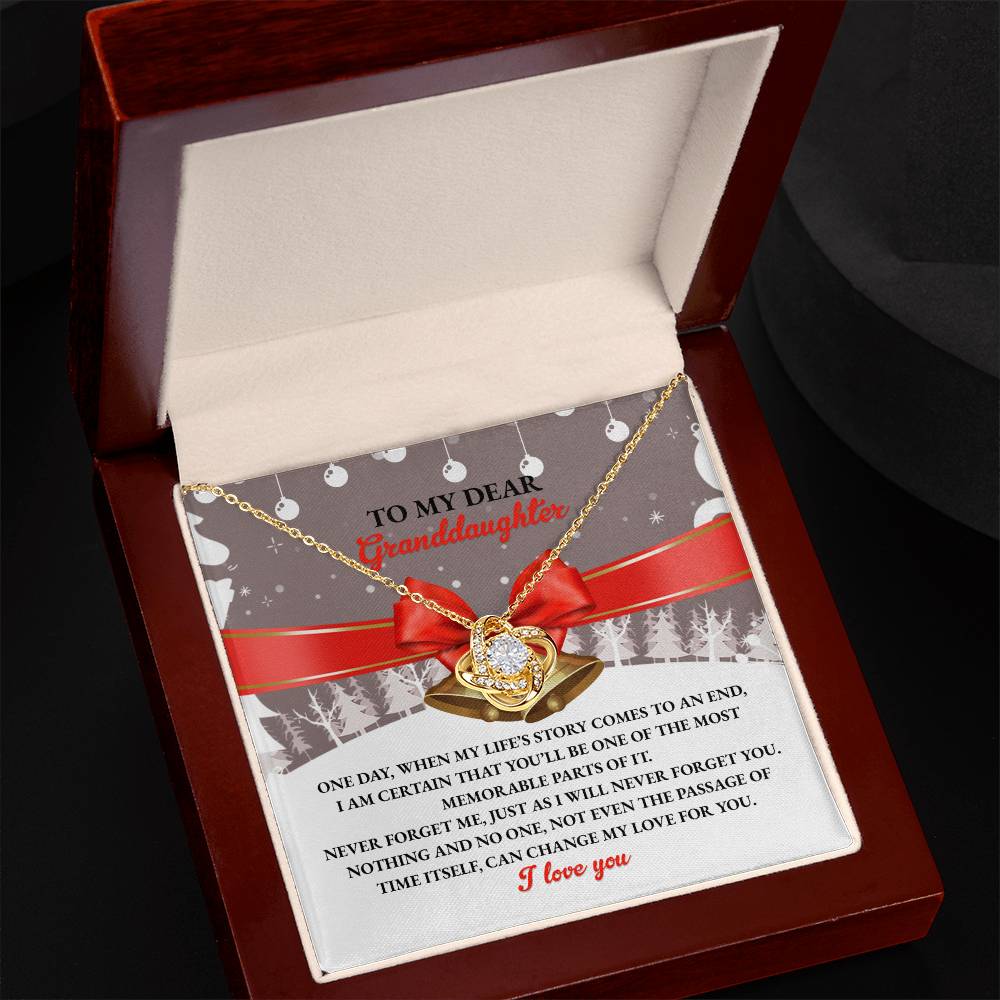 The Granddaughter-Memorable Parts - Love Knot Necklace showcases two intertwined hearts embellished with dazzling cubic zirconia and comes beautifully packaged in a gift box, complete with a heartfelt card personalized for a granddaughter.