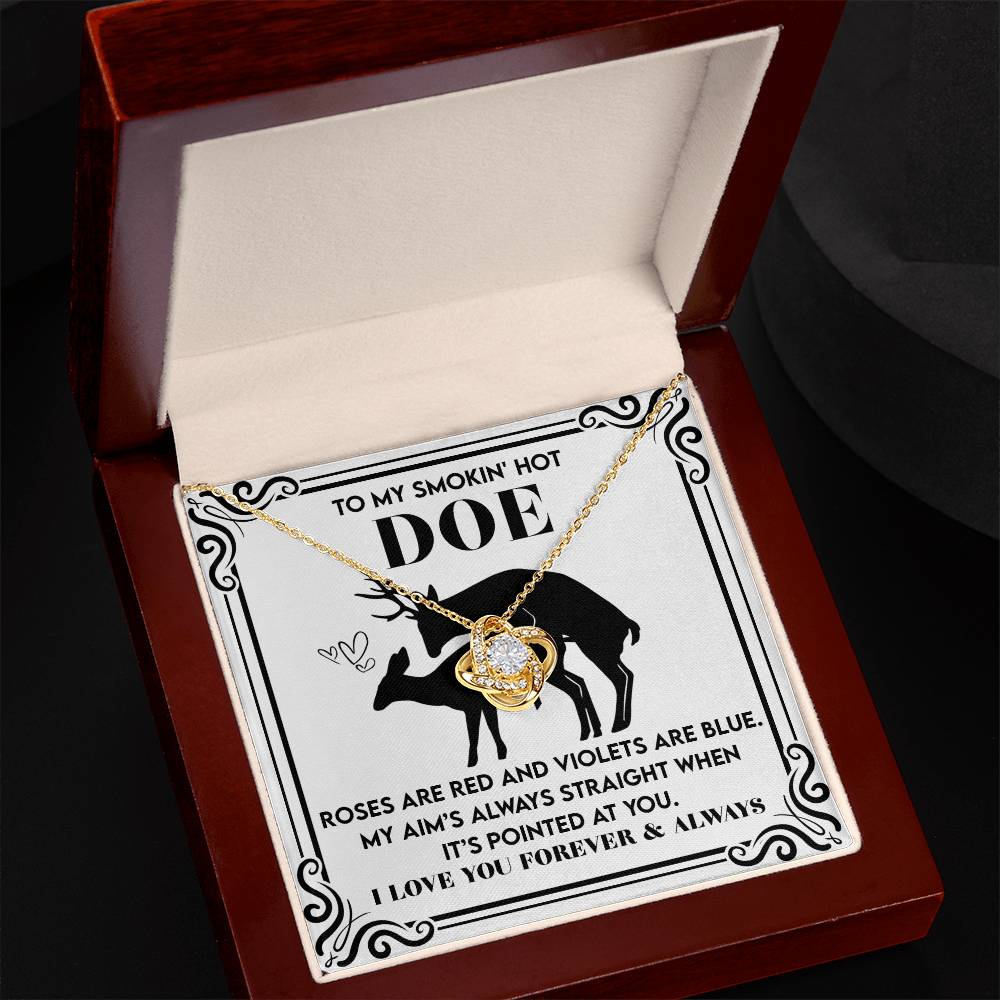 The Soulmate-Pointed At You - Love Knot Necklace features sparkling cubic zirconia set in white gold and comes in a deer-adorned wooden box. Accompanied by a heartfelt poem card, it beautifully expresses love and admiration, ideal for cherished moments.