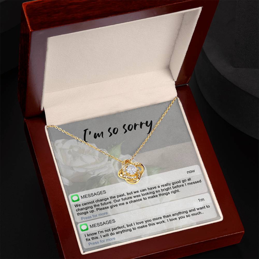 A stunning Sorry-I_m Not Perfect - Love Knot Necklace with cubic zirconia crystals is displayed on an "I'm so sorry" card. Below are text messages expressing regret and love, asking for a chance to make things right.