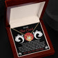 The Soulmate-Of The Line - Love Knot Necklace features a lustrous gold finish and dazzling cubic zirconia. It comes in a box with a card reading "To My Best Catch" and includes a romantic love message.