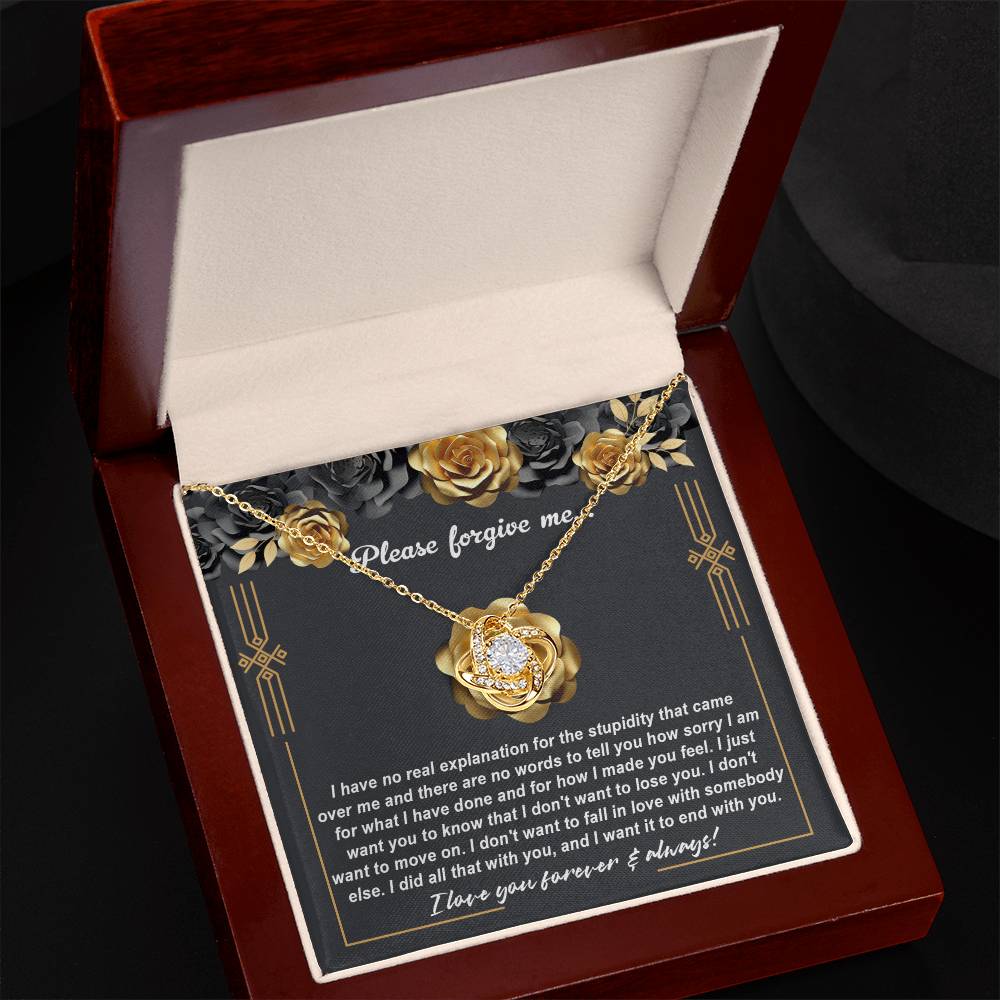 The "Sorry-End With You - Love Knot Necklace" features a beautiful heart-shaped pendant adorned with cubic zirconia crystals, making it a perfect apology gift. The necklace, with its elegant yellow gold finish, is accompanied by a background message expressing deep remorse and a heartfelt desire to stay together.