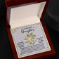 A Love Knot Necklace with a gold finish sits in an open jewelry box. Inside the lid, there is a sentimental message addressed "To my beautiful Daughter." The delicate pendant sparkles with cubic zirconia crystals, reflecting the love and care put into this special gift named the Daughter-Incredible Woman.