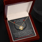 The Sorry-Make Amends - Love Knot Necklace, adorned with dazzling cubic zirconia crystals, rests elegantly in a jewelry box. Inside, there's a heartfelt apology note expressing profound regret and love, turning this personalized gift into something truly special.